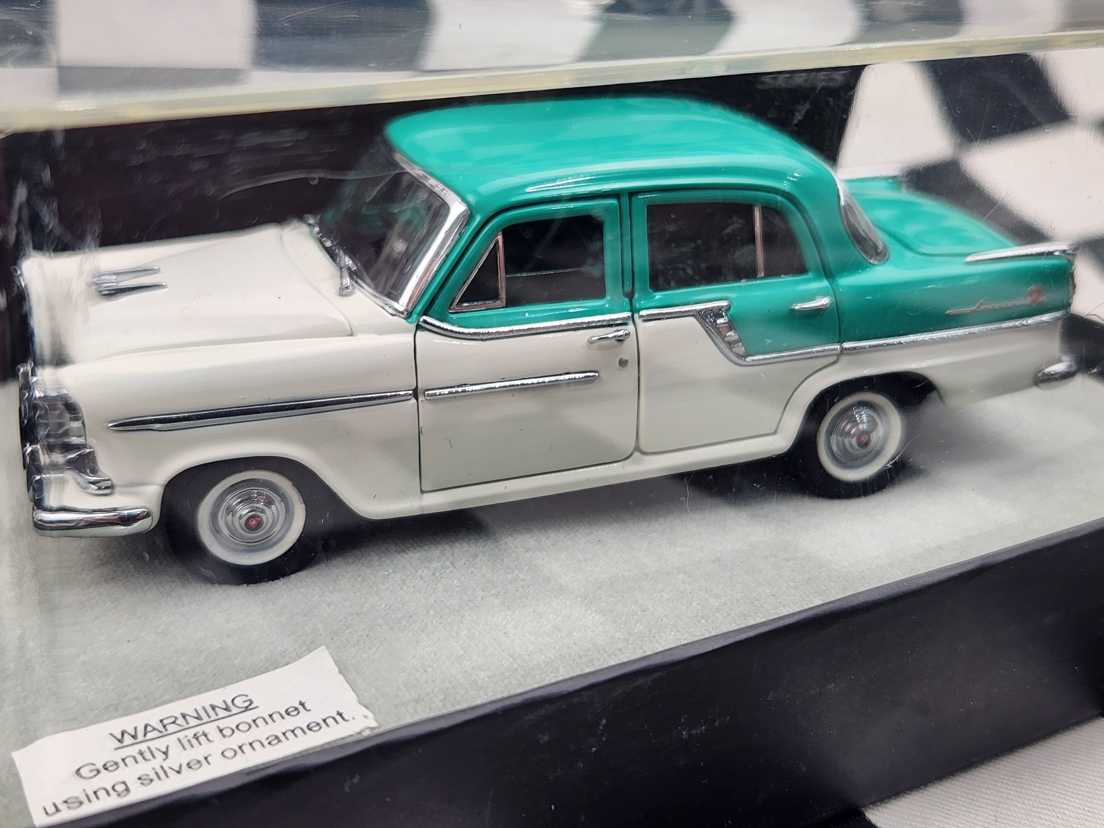 Trax 1:43 Opal Series 1958 FC Holden Special Sedan Two Tone Aqua Green & White TO02