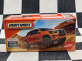 Matchbox Power Grab Toyota Hilux Dual Cab Pickup Orange