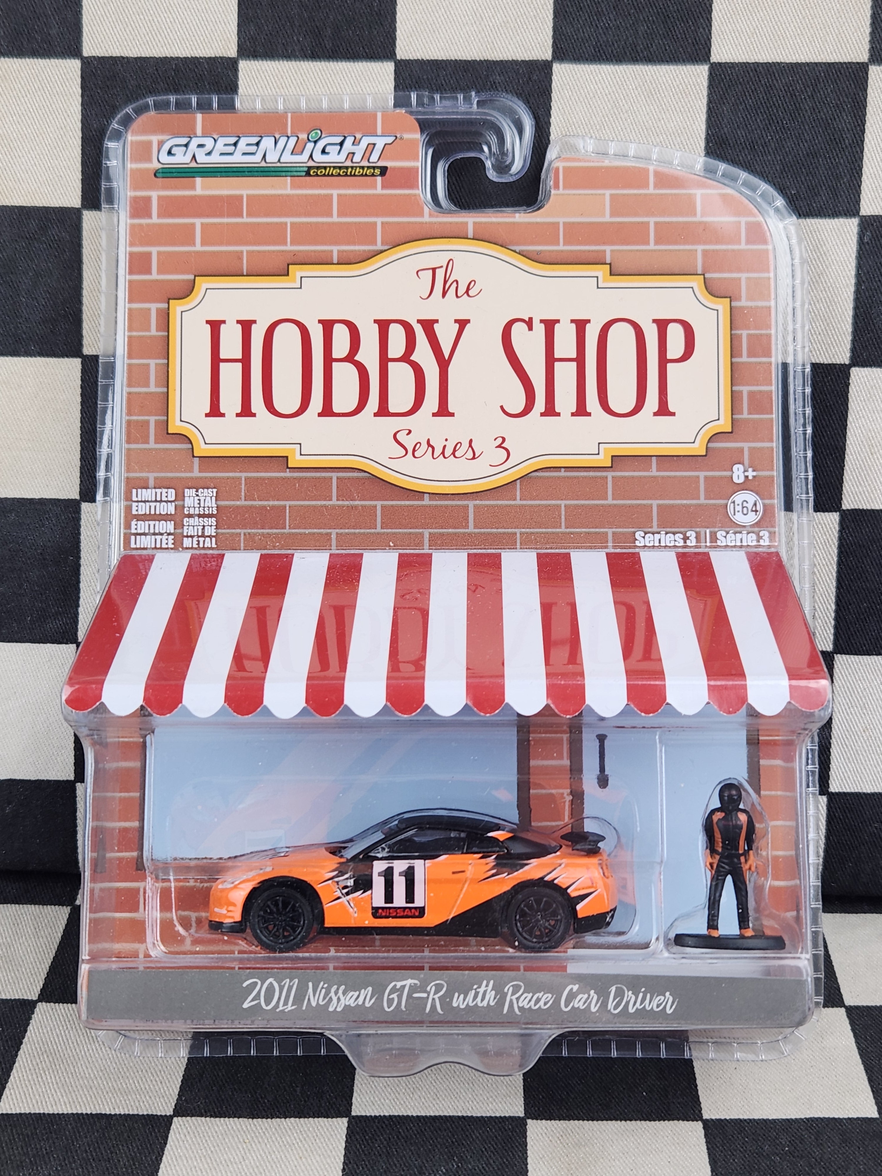 Greenlight Hobby Shop 2011 Nissan Skyline GT-R R35 With Race Car Driver