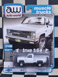 Auto World Muscle Trucks 1986 Chevy Silverado K10 Stepside White