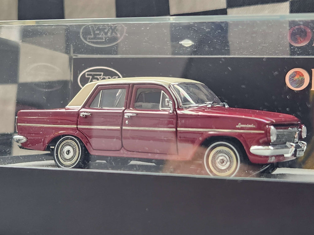 Trax 1:43 Opal Series EH Holden Sedan Winton Red / Fowlers Ivory Roof